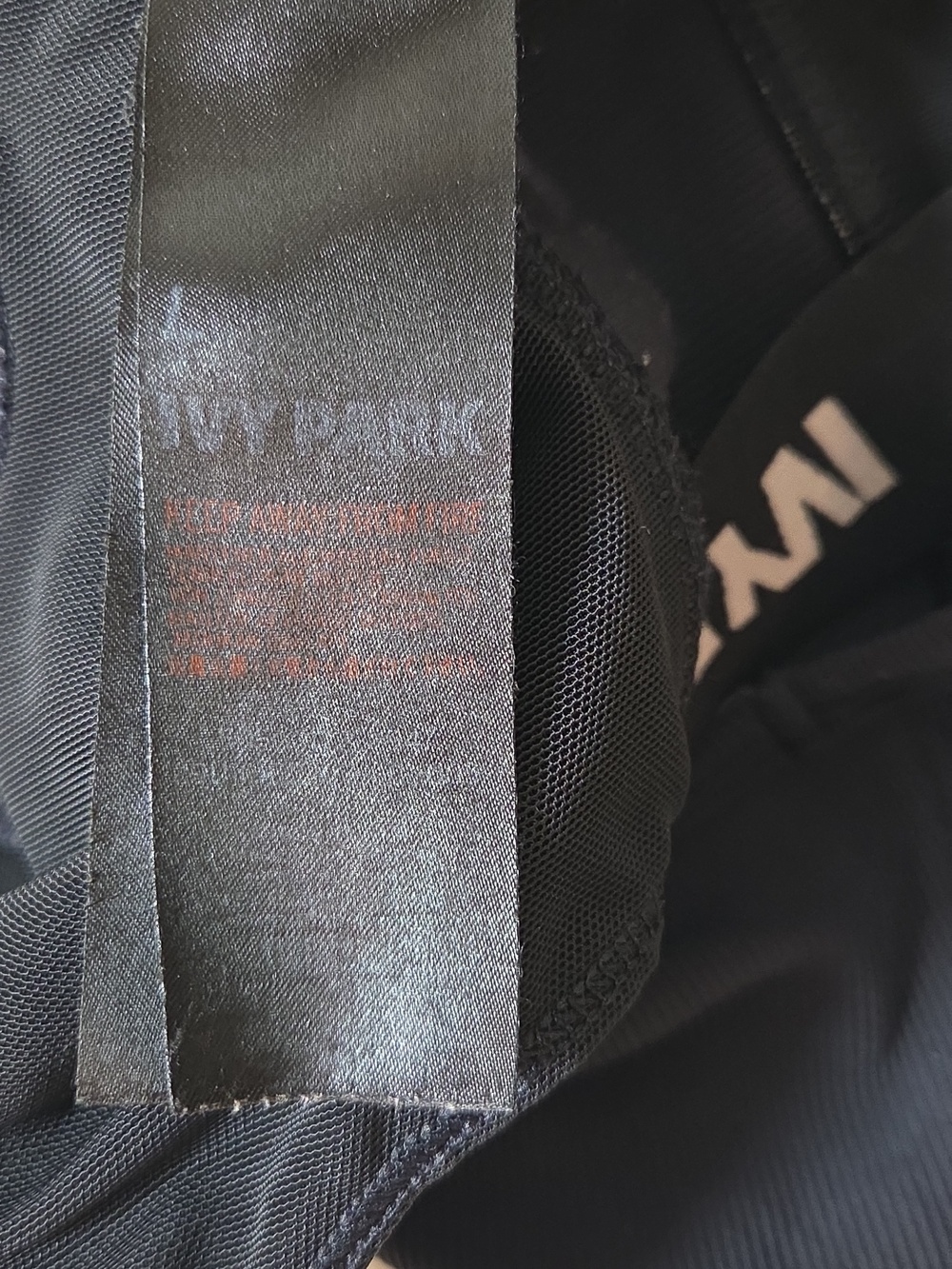 Beyonce Ivy Park Asymmetric Ribbed Crop Tank Top - Picture 5 of 8
